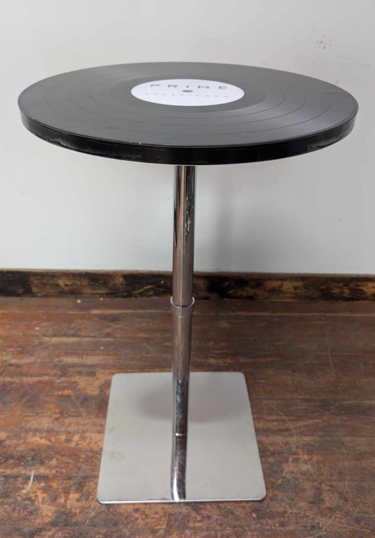 Black Poseur Table with Record Disc Design and Four Stools