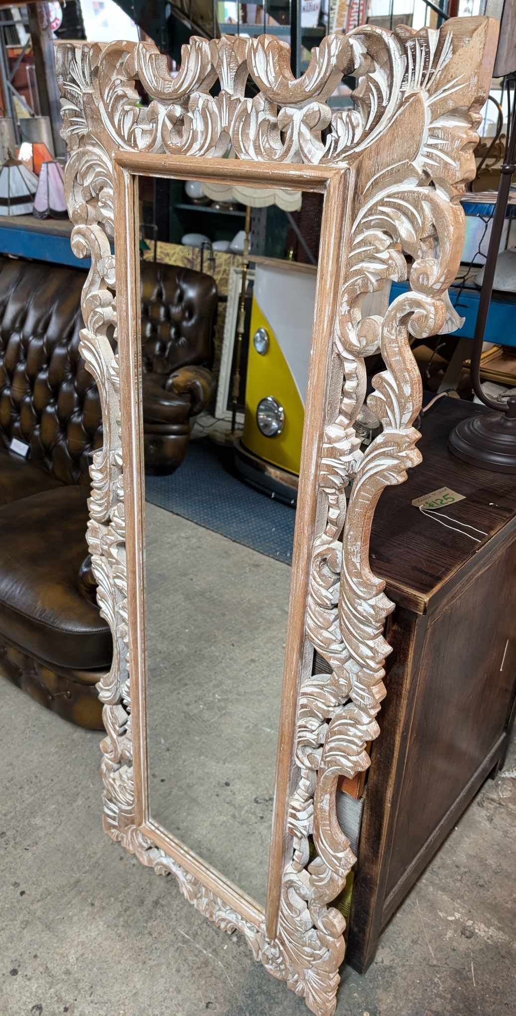 Tall Mirror with Carved Wooden Frame and Sand-Weathered Texture