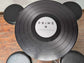 Black Poseur Table with Record Disc Design and Four Stools