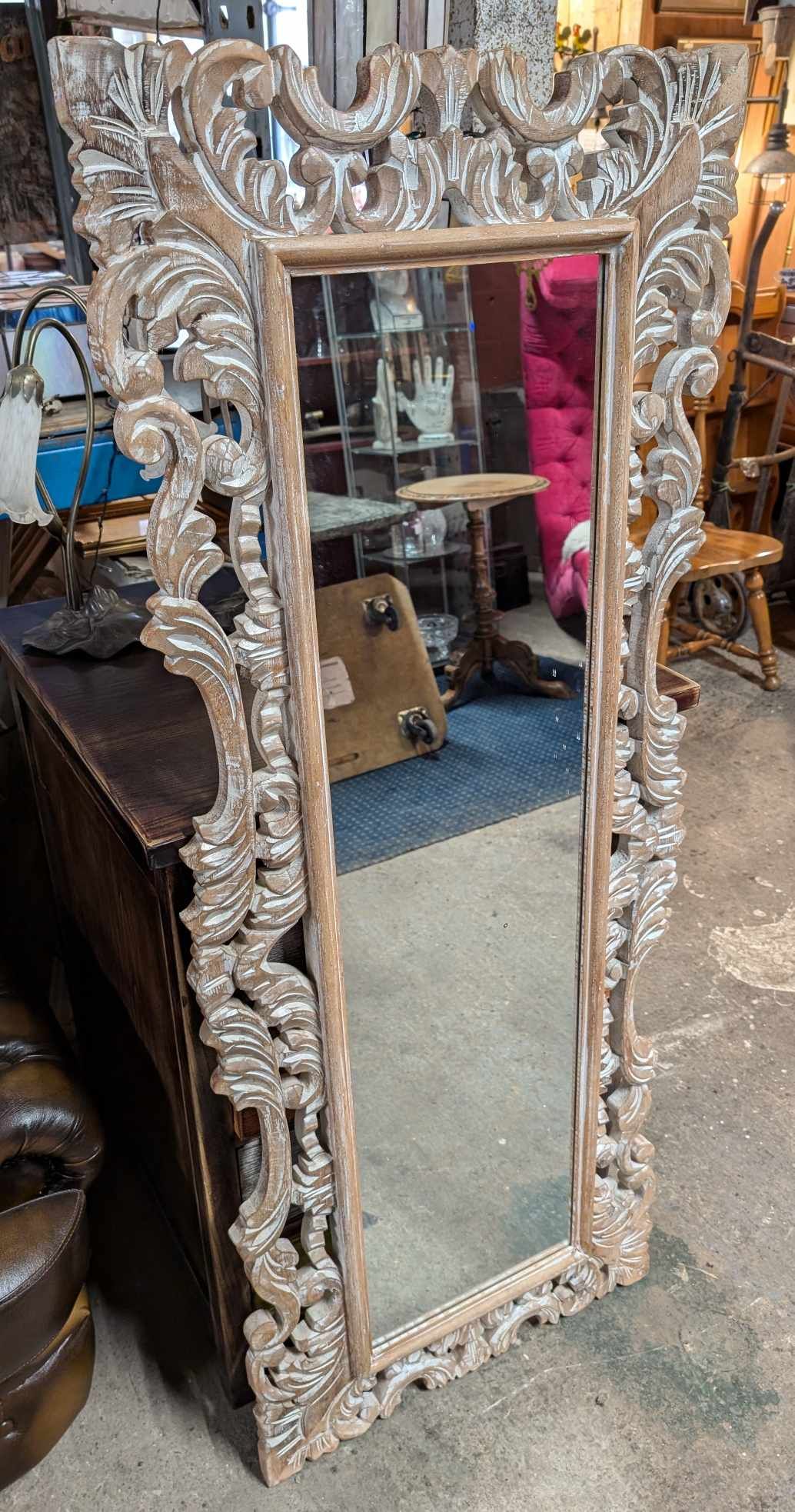 Tall Mirror with Carved Wooden Frame and Sand-Weathered Texture