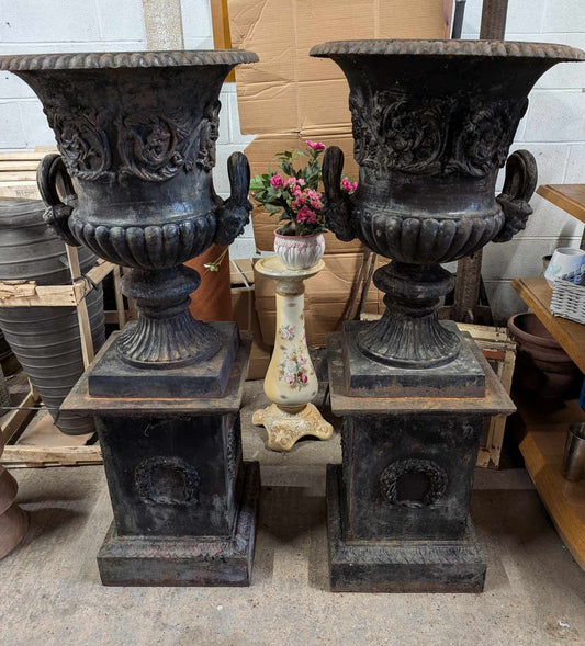 Pair of Cast Iron Urn Planters on Pillar Plinths