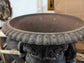 Pair of Cast Iron Urn Planters on Pillar Plinths