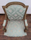 Vintage Ornate Wooden Armchair with Mint Green Upholstery and Floral Patterns