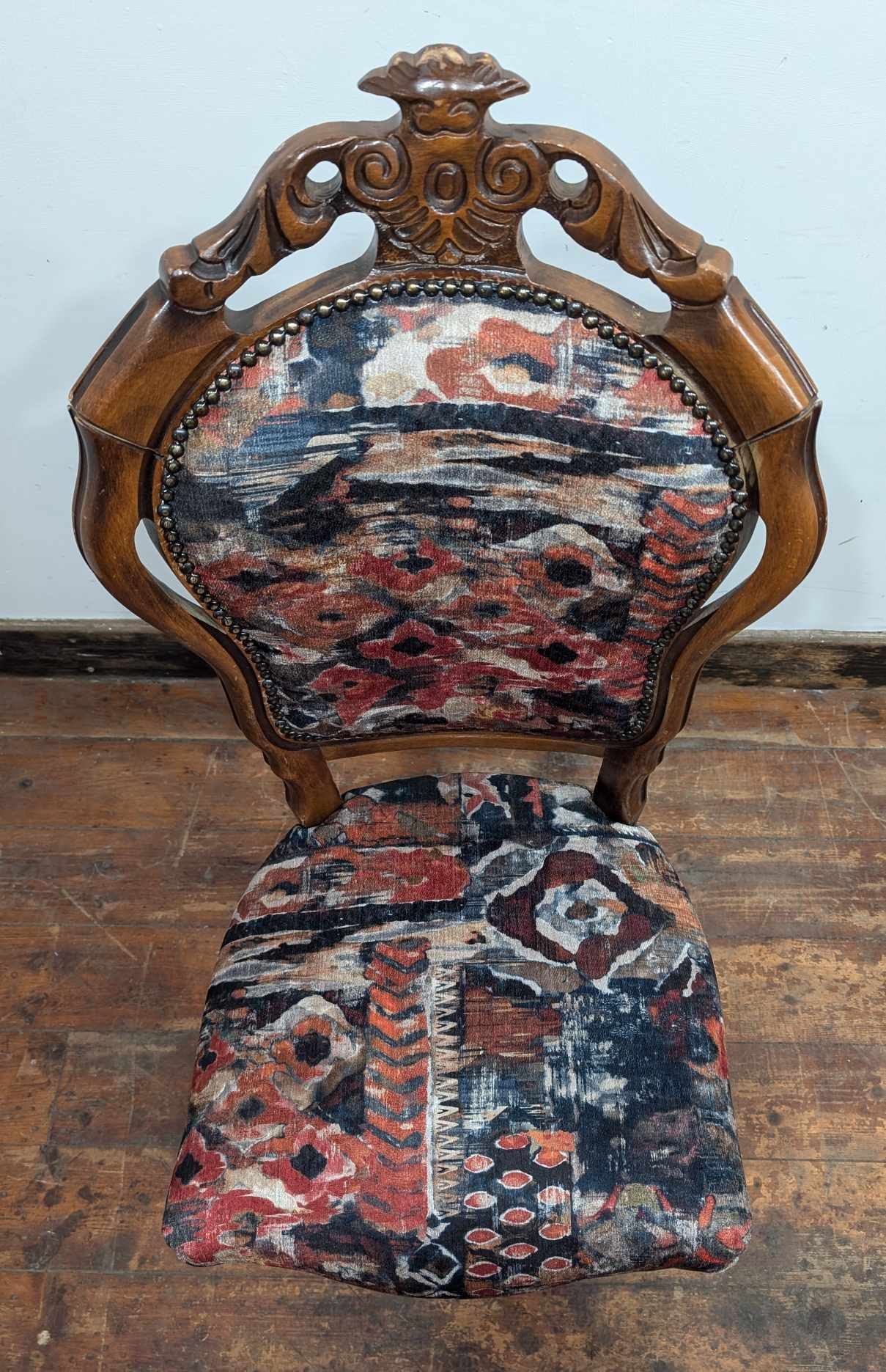 Set of Four Upholstered Mixed Pattern Pub Dining Chairs with Carved Backs