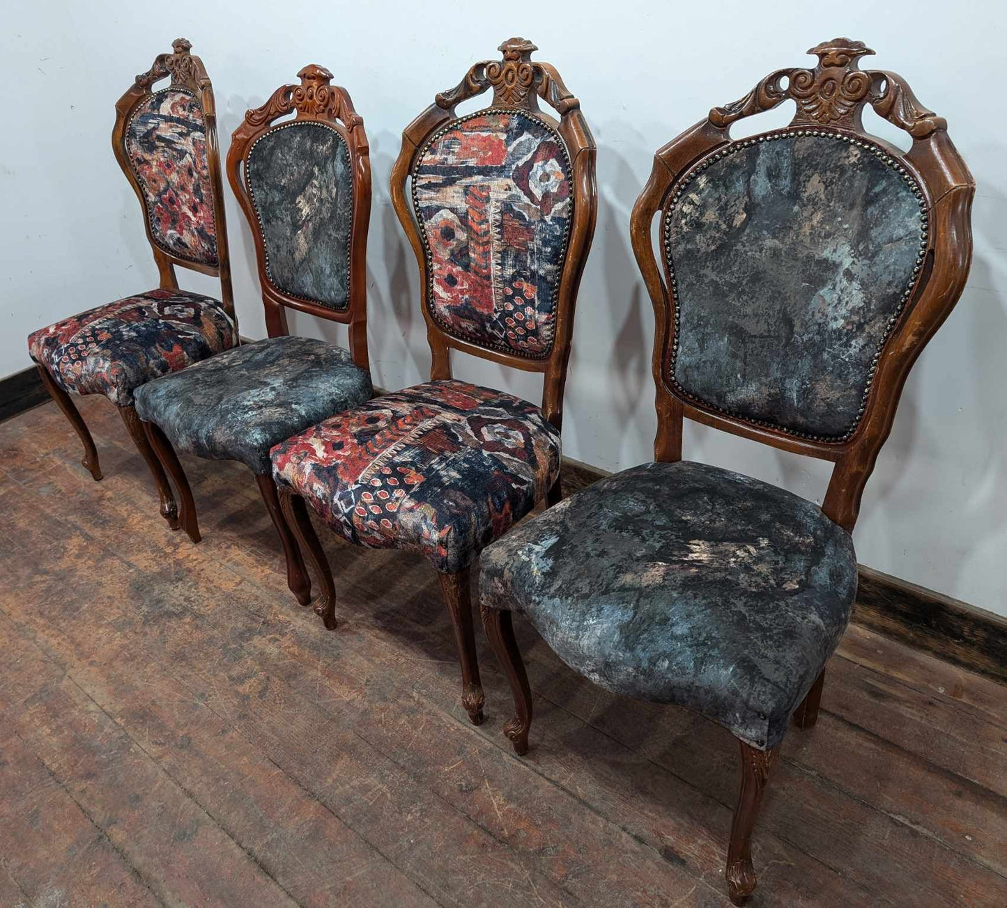 Set of Four Upholstered Mixed Pattern Pub Dining Chairs with Carved Backs