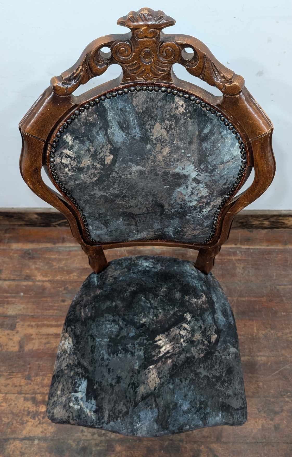 Set of Four Upholstered Mixed Pattern Pub Dining Chairs with Carved Backs