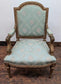 Vintage Ornate Wooden Armchair with Mint Green Upholstery and Floral Patterns