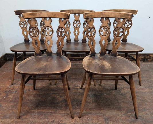 Set of Five Unique Carved Wooden Chairs