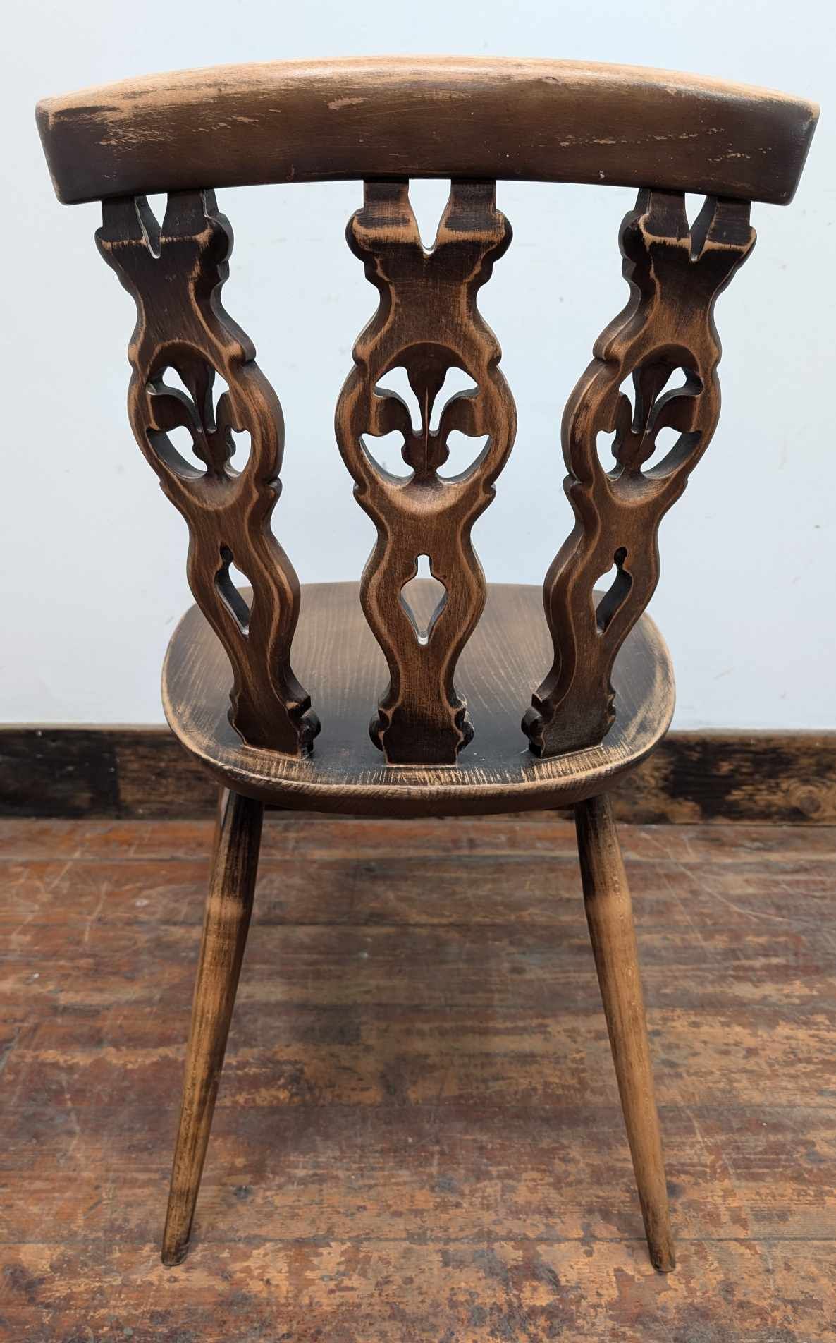 Set of Five Unique Carved Wooden Chairs