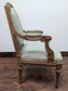 Vintage Ornate Wooden Armchair with Mint Green Upholstery and Floral Patterns