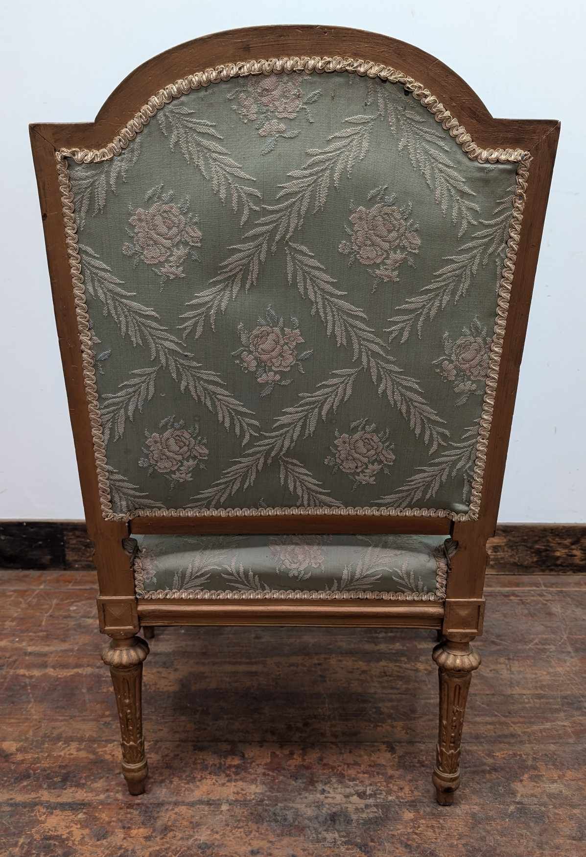 Vintage Ornate Wooden Armchair with Mint Green Upholstery and Floral Patterns