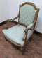 Vintage Ornate Wooden Armchair with Mint Green Upholstery and Floral Patterns