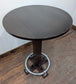 Round Poseur Table with Chrome Footbar and Two Purple Faux Leather Stools