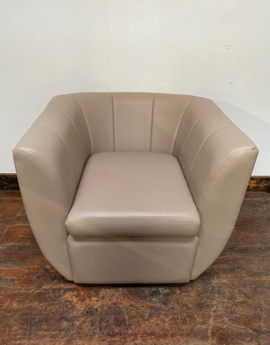 Cream coloured leather armchair