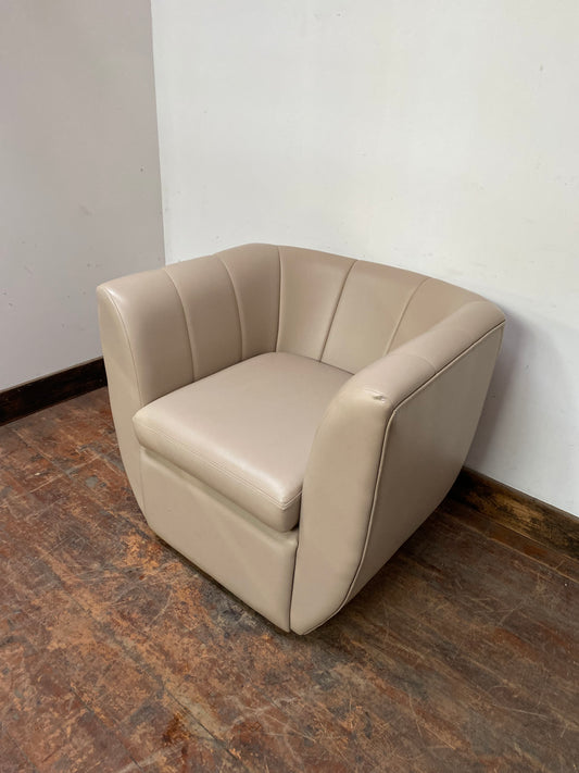 Cream coloured leather armchair