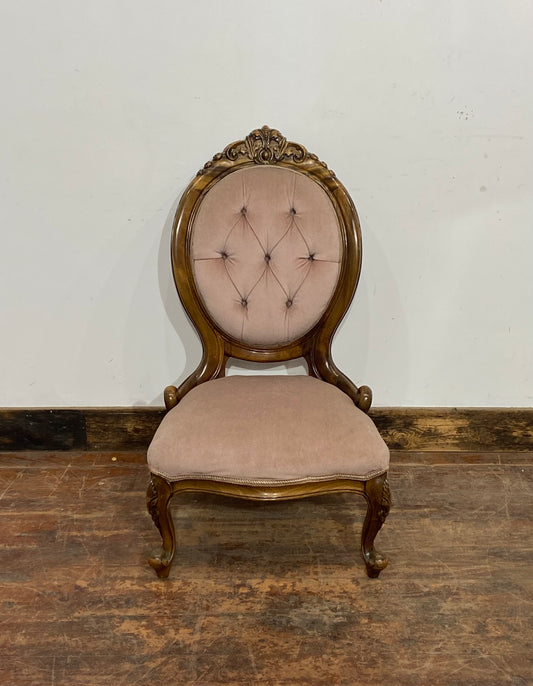 Ornate vintage chair in pink