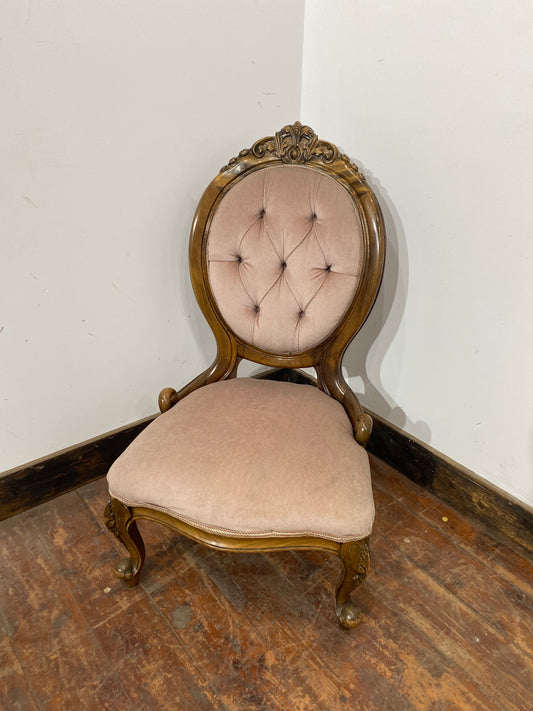 Ornate vintage chair in pink