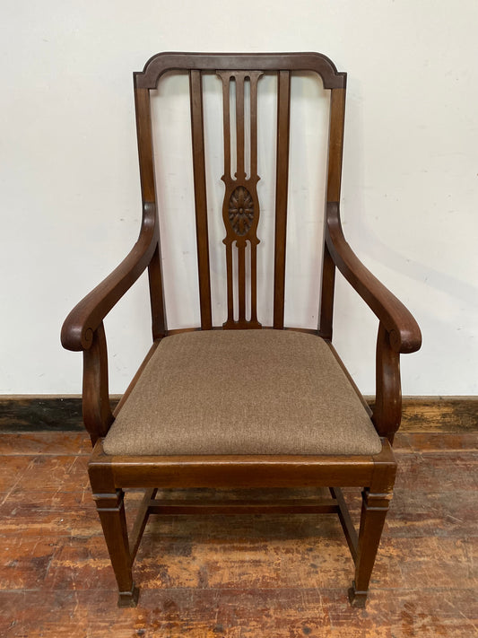 Vintage wooden chair with arms