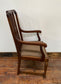 Vintage wooden chair with arms