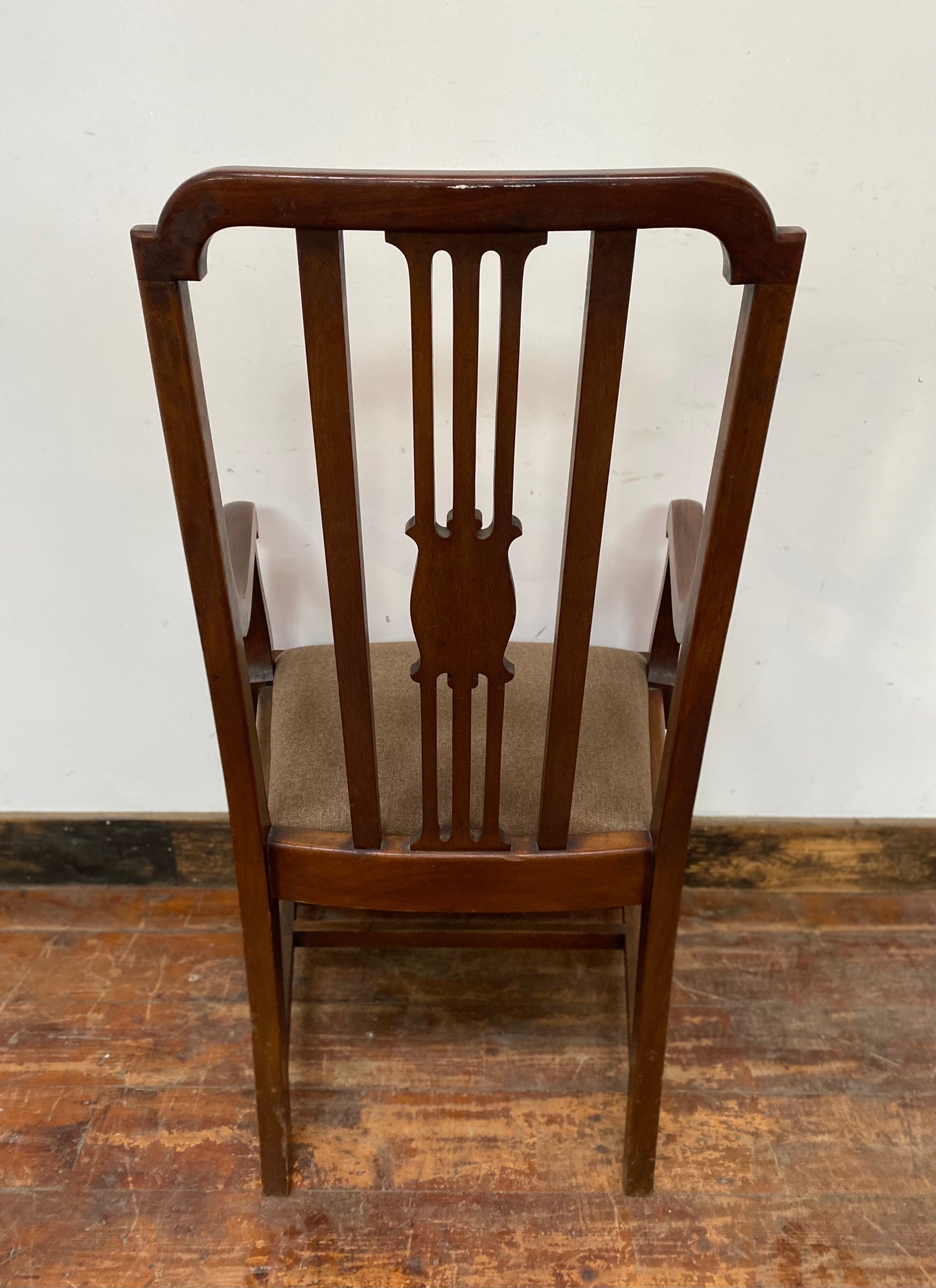 Vintage wooden chair with arms