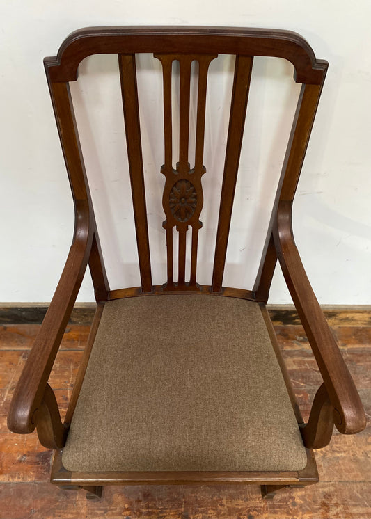 Vintage wooden chair with arms