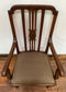 Vintage wooden chair with arms