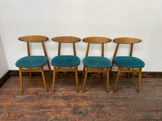 9 curved wooden dining chairs with turquoise seats