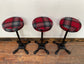 3 tartan bar stools with cast iron bases