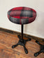 3 tartan bar stools with cast iron bases