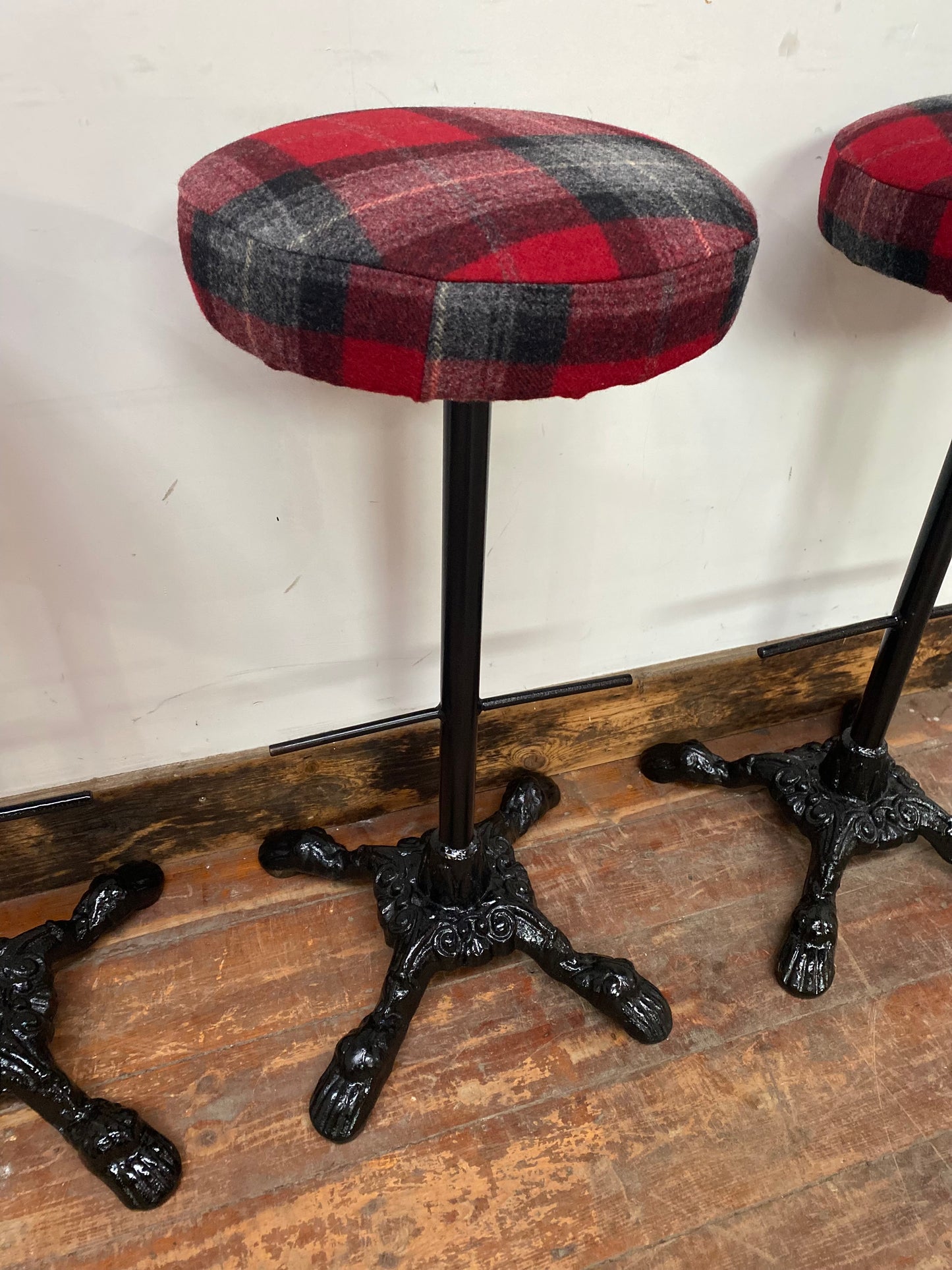 3 tartan bar stools with cast iron bases