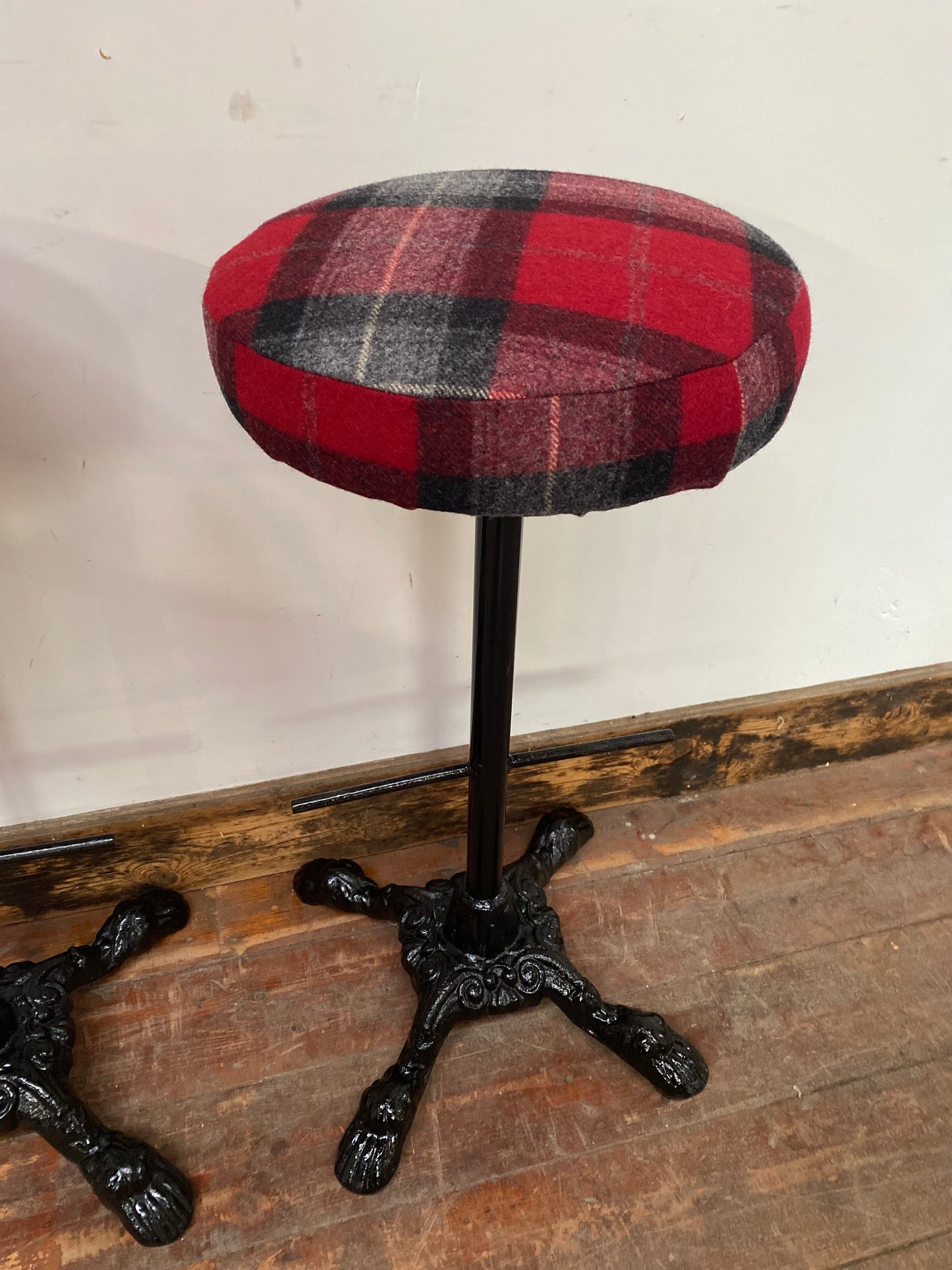 3 tartan bar stools with cast iron bases