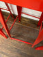 4 red metal stools